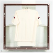 "SHANE WARNE 500 TEST WICKETS" Commemorative Shirt: an Australian Test team short-sleeved shirt with the Australian logo and Warne's team number "350" embroidered in silk together with Travelex sponsorship logos, and signed by Shane Warne; attractively pr - 4
