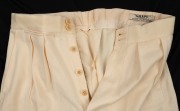 A pair of Clarrie Grimmett's pure wool cricket flannel trousers, circa 1930; with "GRIPU" label to rear waistband. This may have been a spare pair as they show no signs of wear or tear. - 2