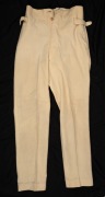 An early pair of Clarrie Grimmett's pure wool cricket flannel trousers, circa 1928; maker unknown. Much worn.