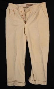 A pair of Clarrie Grimmett's pure wool cricket flannel trousers, circa 1930s; with "Greys Double London Shrunk SLAX" label to rear waistband. Provenance: The Clarrie Grimmett Collection; his family, by descent.