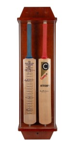 "County Autograph" full sized cricket bat signed by Don Bradman presented in a timber and perspex case alongside an "Australian Captains" bat signed by 19 captains (most autographs faded). 105cm high, 32.5cm wide, 17.5cm deep.