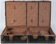 ERNIE BROMLEY's 1934 tour to England fully-fitted metal-bound cabin trunk bearing the marker's label 'THE PEARLITE WARDROBE TRUNK', with remnants of some stickers and 'E. H. BROMLEY' painted to one end. 98 x 57 x 38cm. - 2