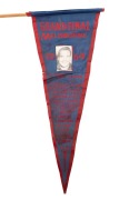 MELBOURNE GRAND FINAL 1964 red & blue supporters pennant on the original stick; depicting Ron Barassi at the top and the full team listed below him. Overall 49cm.