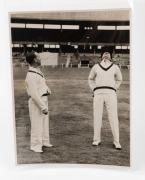 A BRADMAN TRIO: An original press photograph of Bradman and Hassett sharing a laugh at the MCG (probably during Bradman's Testimonial Match); a copy of an article by Harry Kneebone, titled "Bradman hits 123 In Own Testimonial" personally signed by Bradman - 5