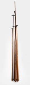 Five assorted billiard cue accessories from WALTER LINDRUM'S personal billiard room in Albert Park, Melbourne. Mixed vintages and manufacturers. The largest 217cm long.
