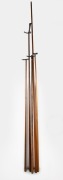 Five assorted billiard cue accessories from WALTER LINDRUM'S personal billiard room in Albert Park, Melbourne. Mixed vintages and manufacturers. The largest 217cm long.