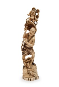 An antique Japanese marine ivory Okimono with demon figure and fisherman, Meiji period, 19th/20th century, 30cm high