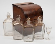 An antique English mahogany four bottle spirit tantalus&nbsp;with original gilt decorated decanters and glass, circa 1830, 23cm high, 18cm wide, 18cm deep - 2