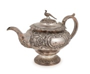 An antique Scottish sterling silver teapot with&nbsp;repousse floral decoration and pheasant finial, made in Edinburgh, circa 1834, 18cm high, 27cm wide, 766 grams