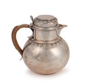 An antique English sterling silver bachelor's pot with rattan handle, made by Charles Stuart Harris of London, circa 1889, 13cm high, 382 grams total
