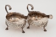 A fine pair of antique English sterling silver sauce boats, made by Robert and David Hennell of London, circa 1765, 10cm high, 13cm wide, 314 grams total - 2