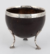 An antique sterling silver mounted coconut cup resting on pad feet, circa 1800, 9cm high - 2