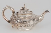 A Georgian sterling silver teapot with greyhound finial, by Charles Gordon of London, circa 1813, 14cm high, 27.5cm wide, 668 grams - 2
