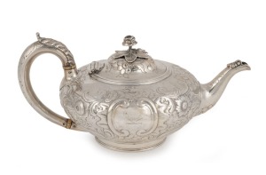 An antique English sterling silver teapot with cast rose finial, made in London, circa 1847, 13cm high, 27cm wide, 602 grams