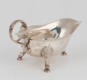 An antique Irish silver sauce boat, by Richard Garde of Dublin, early 19th century, 9cm high, 17.5cm wide, 208 grams - 2
