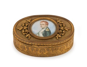 An antique French gilt bronze oval jewellery casket with hand-painted portrait of Napoleon Boneparte to the lid, 19th century, 9.3cm wide