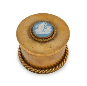 An antique gilt bronze circular box adorned with Wedgwood Jasper Ware classical plaque, mid 19th century, 8.05cm high, 11cm diameter&nbsp;