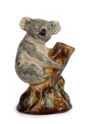 GRACE SECCOMBE Billy Blue Gum pottery koala tree stump vase, incised "G. Seccombe, Australia", 21cm high