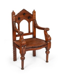 An antique Australian cedar Gothic throne chair with carved decoration, Bendigo origin, mid 19th century, 118cm high, 72cm wide, 60cm deep.