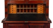 REDMOND BARRY'S BOOKCASE, Australian cedar secretaire bookcase with carved lamb's tongue corbels and fall front, interior fitter with writing slope, drawers and compartments, manufactured by GEORGE THWAITES of Melbourne, 19th century. 245cm high, 140cm w - 2