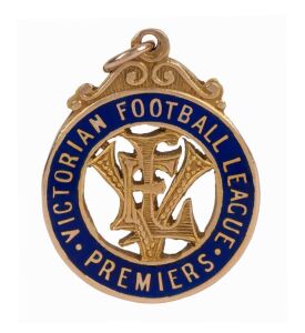 THE 1933 SOUTH MELBOURNE PREMIERSHIP MEDAL PRESENTED TO HEC. McKAY Having debuted for the Swans in 1926 and won their Best & Fairest Award the following season, Hector Alexander McKay played at fullback in the club's 1933 Grand Final win. This lot comprises of the official VFL Premiership medal in 15ct gold and blue enamel, engraved verso "SOUTH MELB. F.C. 1933 H. McKAY". Accompanying the rare Premiership Medal is McKay's 9ct gold enamel "STH. MELB. F.C. HON. LIFE MEMBER" fob.
