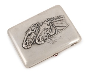 An antique Russian silver cigarette case with repousse horse decoration and cabochon&nbsp;ruby clasp, 19th/20th century, 11.5cm wide, an impressive 218 grams