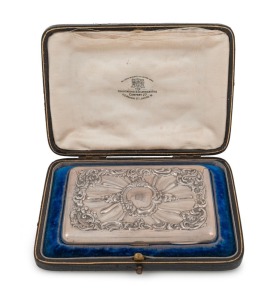An antique sterling silver lady's pocket note case with repousse decoration&nbsp;and engraved crown, interior fitted with brown leather compartments and ivory note pad, housed in original plush fitted leather case, circa 1900,10.5cm wide, 144 grams