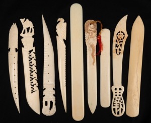Eight assorted carved ivory and bone letter openers and paper knives, mixed vintages and origins, the largest 22cm long