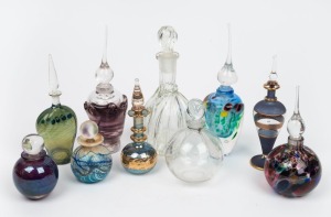 Ten assorted art glass perfume bottles including Lalique, Isle of Wight and Australian examples, the largest 17cm high