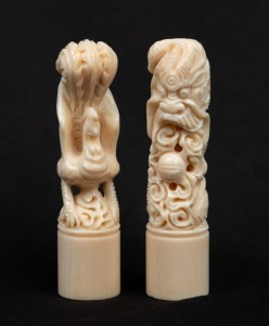 A pair of carved ivory dragon and rooster seals, early to mid 20th century, ​​​​​​​6cm high