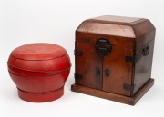 A Chinese red lacquered finish rice box, together with a Chinese elm travelling box fitted with drawers, compartments and mirror, (2 items), the large 38cm high