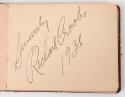 ERNIE BROMLEY'S AUTOGRAPH BOOK A small, tartan covered autograph book, signed by Bromley to the front page and subsequently by many famous cricketers of his day: noted the New South Wales XI of 1934&nbsp; (Oldfield, Fingleton, Chipperfield, Kippax, Brown, Hill - 9