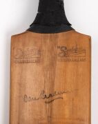 A full-sized "Don Bradman" Three Crowns cricket bat by Sykes, signed by the 1948 Invincibles including Bradman, Hassett, Brown, Saggers, Harvey, Johnson, Ring, Miller, and others, but mostly faded.&nbsp; - 5