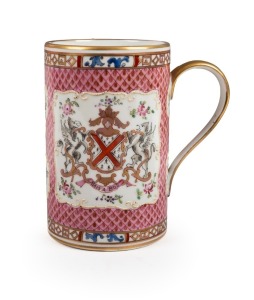 An Armorial porcelain tankard in the Chinese style, 18th century, faux seal mark to base, 14cm high