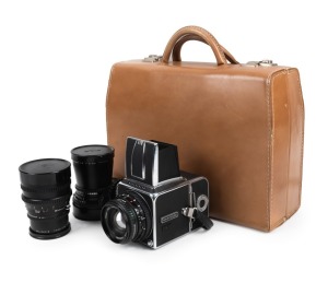 HASSELBLAD:&nbsp;500C/M SLR camera, c. 1970, in original leather case with Zeiss 80mm f2.8/50mm f4/150mm f4 lenses,&nbsp;front and rear caps, viewfinder, additional camera back, lens filters in cases, booklets, and others. Single ownership, having originally been p