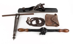 MATHIESON antique keg hole cutter, a finger pull chainsaw in original leather pouch with sharpening tool, a BAILEY No.# 7 plane, and an antique saw tooth setter&nbsp;(large), (4 items), ​​​​​​​the largest 58cm wide