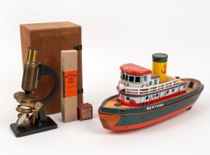 "NEPTUNE" vintage tin-plate battery operated&nbsp;tugboat, together with a monocular microscope in box with attachments, (2 items), ​​​​​​​the boat 36cm long