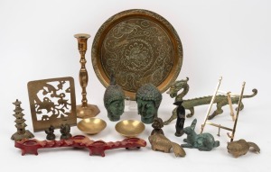 Assorted brass and bronze Oriental ornaments including bronze dragon on timber stand, bronze Buddha heads, opium weights etc., (15 items), the dragon 30cm long