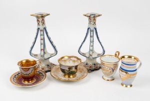 A pair of antique French ceramic candlesticks signed "Rouen"; together with four assorted antique Bohemian Biedermeier cups and two saucers, 19th century, (8 items), the candlesticks 24.5cm high