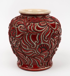 A Chinese crackle glaze vase, with raised red enamel floral decoration, with character marks to the base. 19/20th century. 20cm high.&nbsp;