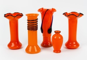 A selection of five Bohemian orange Tango glass vases with applied blue and black trim and trail decoration, various shape designs by Franz Welz, circa 1920s, the largest 23cm high.