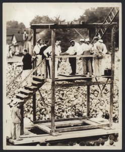 UNITED STATES LYNCHINGS & EXECUTIONS: Haunting group of nine 1930s press photographs, the largest 20.5 x 25cm, depicting various lawful and unlawful killings of African American men, with one particularly disturbing image taken from within a crowd of onlo