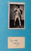 An album containing a collection of signed photographs, cards, postcards and cuttings, with the signatories including Archie Moore, Dado Marino, Sam Ichinose, Freddie Mills, Doug Miller, Rinty Monaghan, Andries Steyn, Manuel Ortiz, Danny O'Sullivan, Jim P - 4