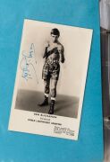 An album containing a collection of signed photographs, cards, postcards and cuttings, with the signatories including Archie Moore, Dado Marino, Sam Ichinose, Freddie Mills, Doug Miller, Rinty Monaghan, Andries Steyn, Manuel Ortiz, Danny O'Sullivan, Jim P - 9