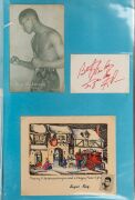 An album containing a collection of signed photographs, cards, postcards and cuttings, with the signatories including Archie Moore, Dado Marino, Sam Ichinose, Freddie Mills, Doug Miller, Rinty Monaghan, Andries Steyn, Manuel Ortiz, Danny O'Sullivan, Jim P - 21