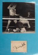 An album containing a collection of signed photographs, cards, postcards and cuttings, with the signatories including Archie Moore, Dado Marino, Sam Ichinose, Freddie Mills, Doug Miller, Rinty Monaghan, Andries Steyn, Manuel Ortiz, Danny O'Sullivan, Jim P - 26