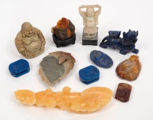 Eleven assorted Chinese carved hardstone ornaments including Buddha statues, lapis lion etc., the largest 25cm long