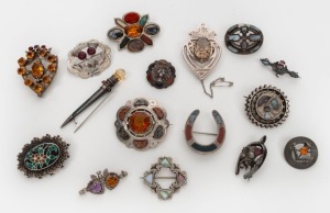 Sixteen assorted antique silver Scottish brooches, set with hard stone and paste, 19th/20th century, the largest 7cm long