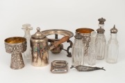 Silver plated spirit kettle stand, sterling silver cigarette case, silver plated coffee pot, silver plated goblets, six crystal cruet bottles with silver tops and a silver fish trinket, (12 items)