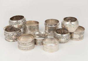 A mixed lot of antique English napkin rings including seven sterling silver examples (one matched pair), together with three silver plated napkin rings (one matched pair). 19th and 20th century (10 items), 140 grams silver weight.&nbsp;
